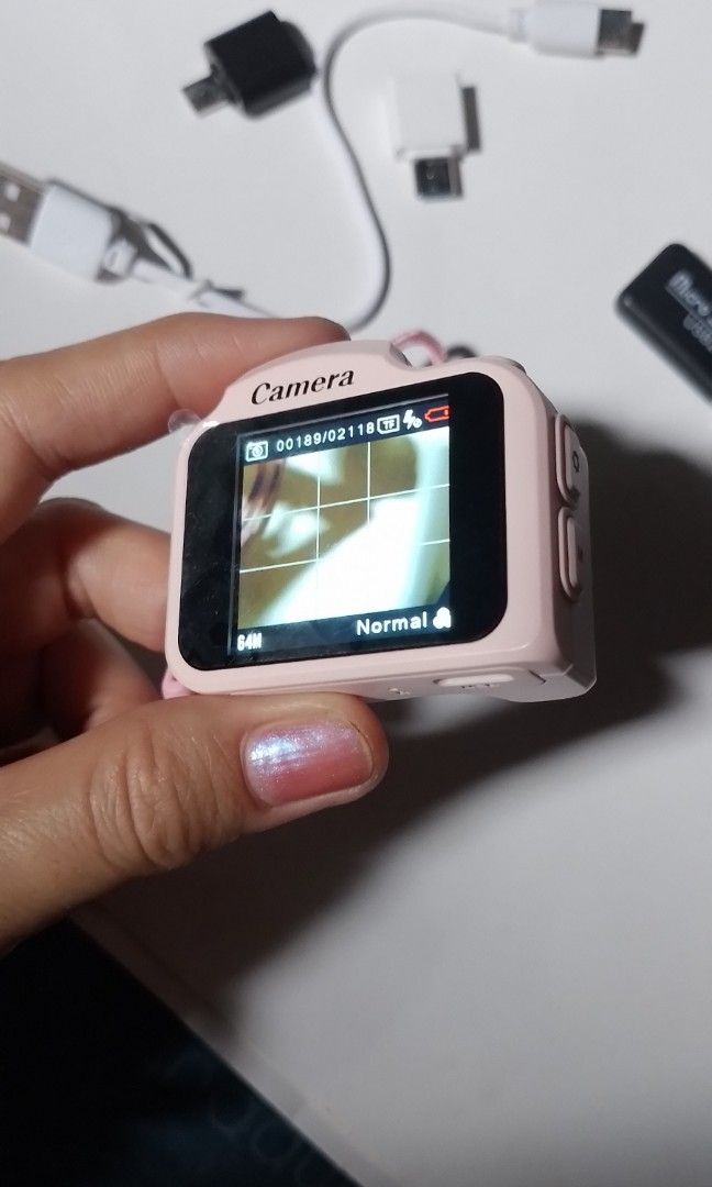 Pink Mini 4k Digital Camera 64mp (Category: Cameras) located in Batangas. Submitted by zenrez_shop (Listing ID 1466210546, Image 3). Description: Color pink Pwedeng Keychain sa bag Pocket retro Nostalgia Camera with LED Light Pink with box, camera strap, type C cable, with micro USB (memory card not included) walang gasgas may plastic pa ang screen brand: Vetek.