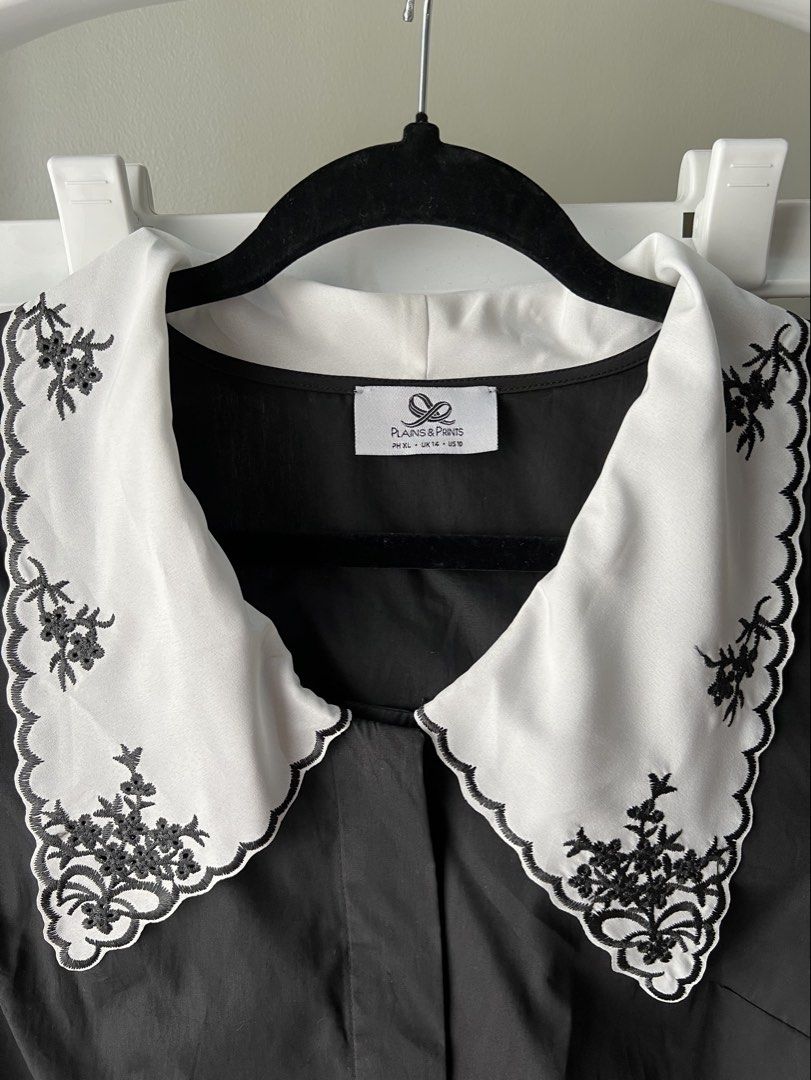 Plains & Prints Black Blouse with Embroidered Collar (Category: Blouses) located in Davao. Submitted by bengscloset (Listing ID 1466207132, Image 2). Description: Brand: Plains & Prints Size: XL (UK 14 / US 10) Color: Black blouse with contrasting white statement collar Condition: Clean and well-kept 📌 No rush shipping. 📦 Shipping fee c/o buyer. 📍Davao City 💌 Feel free to message me for additional photos/details. Thank you for checking out my