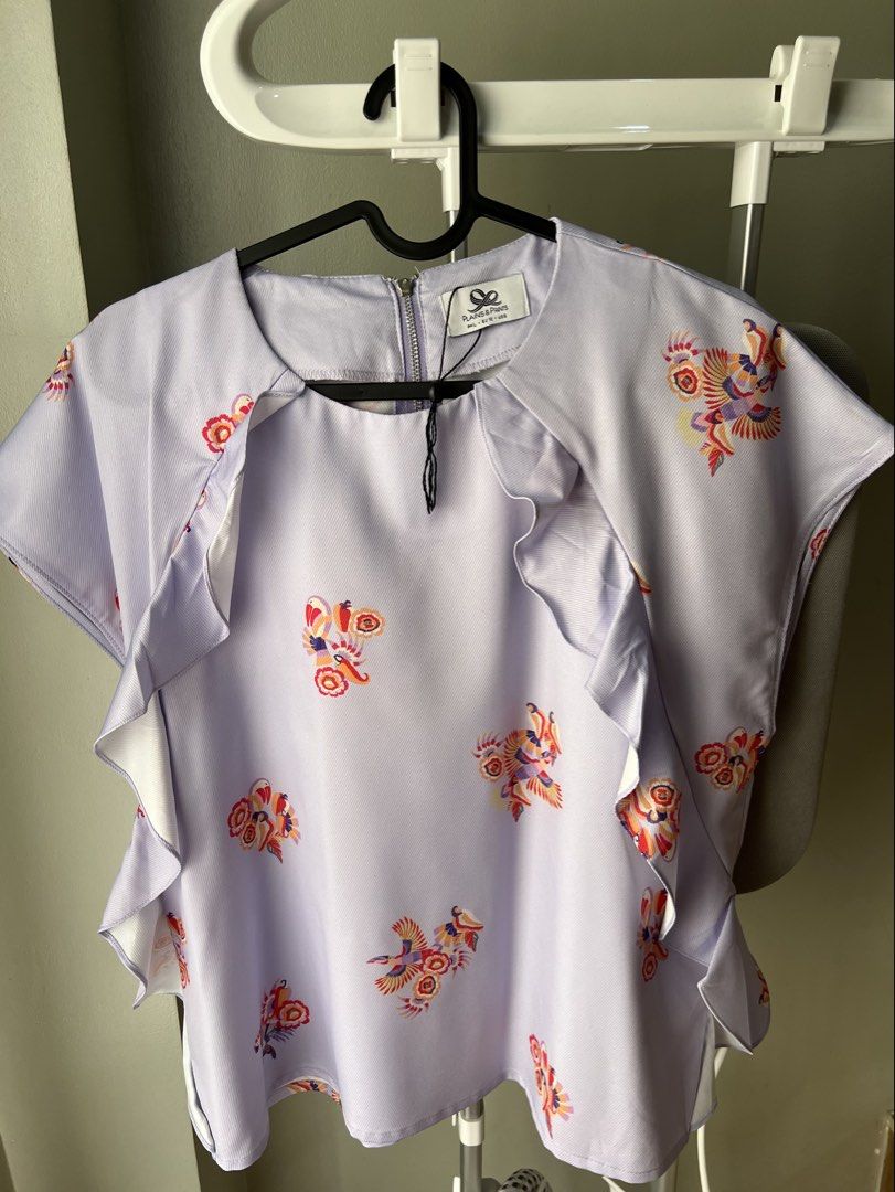Plains & Prints Ruffle Blouse size L (Category: Blouses) located in Davao. Submitted by bengscloset (Listing ID 1466205420, Image 1). Description: Brand: Plains & Prints Color: Light Blue with colorful bird print Size: L / EU 12 / US 6 Condition: Clean and well-kept 📌 No rush shipping. 📦 Shipping fee c/o buyer. 📍Davao City 💌 Feel free to message me for additional photos/details. Thank you for checking out my listing! ♡.