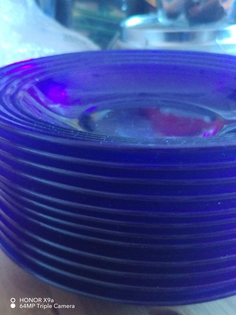 Plate 12 Pcs (Category: Dinnerware & Cutlery) located in Muntinlupa City. Submitted by arciagamaryann68 (Listing ID 1466202571, Image 1). Description: - Set of 12 matching blue plates - Features a stylish ribbed ring design - Vibrant blue color adds elegance to any dining setup - Sturdy construction suitable for daily use.