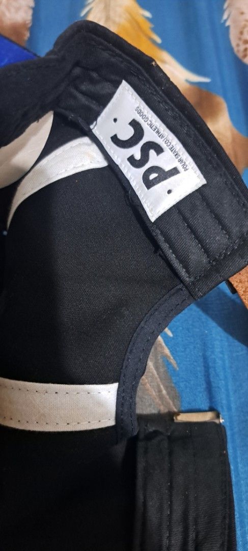Polar Skate Co. Black Hat With Beltstrap (Category: Caps & Hats) located in San Fernando, Camarines Sur. Submitted by ladderaya (Listing ID 1466232754, Image 3). Description: - Brand: Authentic Polar Skate Co. - Color: Solid black with a blue brim underside - Design: Clean white embroidered logo with a blue accent line - Closure: Adjustable brown leather beltstrap with a metal buckle - Details: Original store sticker still attached to the brim - 