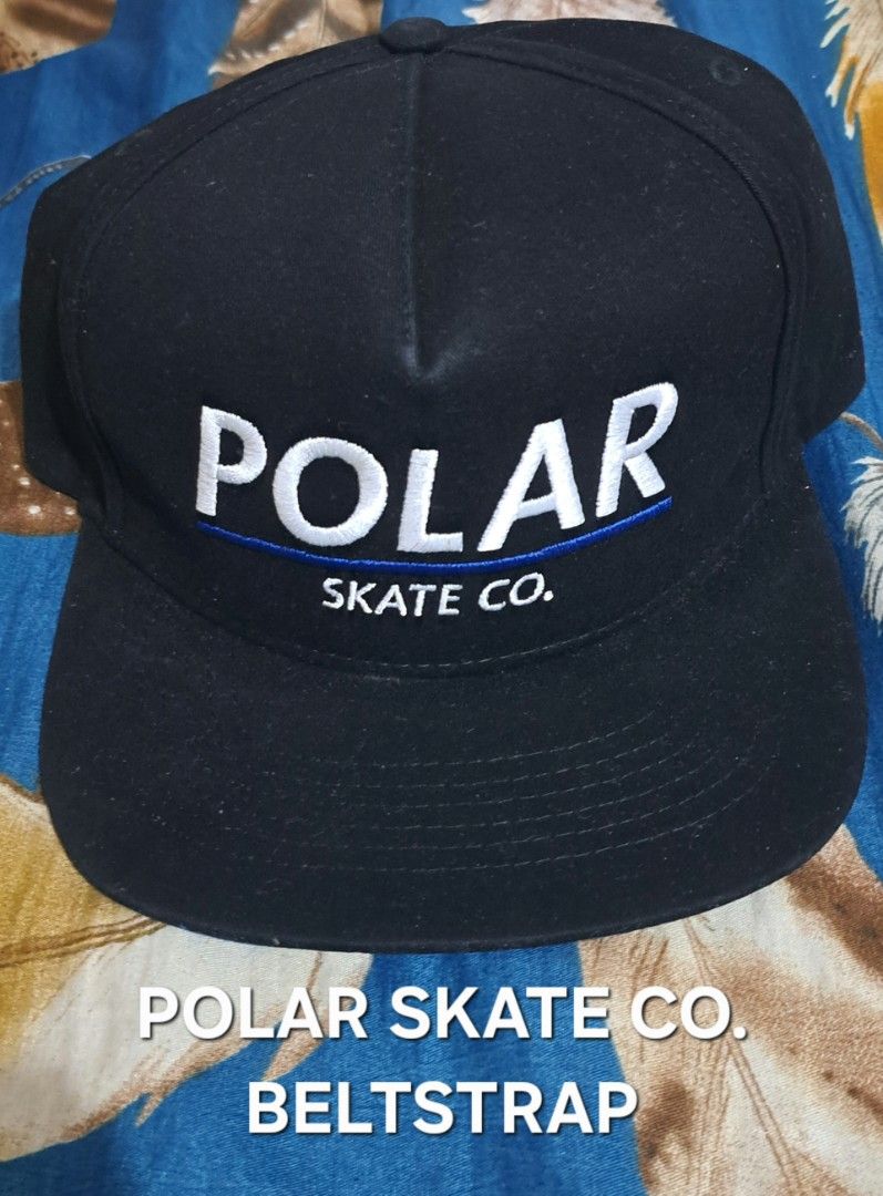 Polar Skate Co. Black Hat With Beltstrap (Category: Caps & Hats) located in San Fernando, Camarines Sur. Submitted by ladderaya (Listing ID 1466232754, Image 1). Description: - Brand: Authentic Polar Skate Co. - Color: Solid black with a blue brim underside - Design: Clean white embroidered logo with a blue accent line - Closure: Adjustable brown leather beltstrap with a metal buckle - Details: Original store sticker still attached to the brim - 