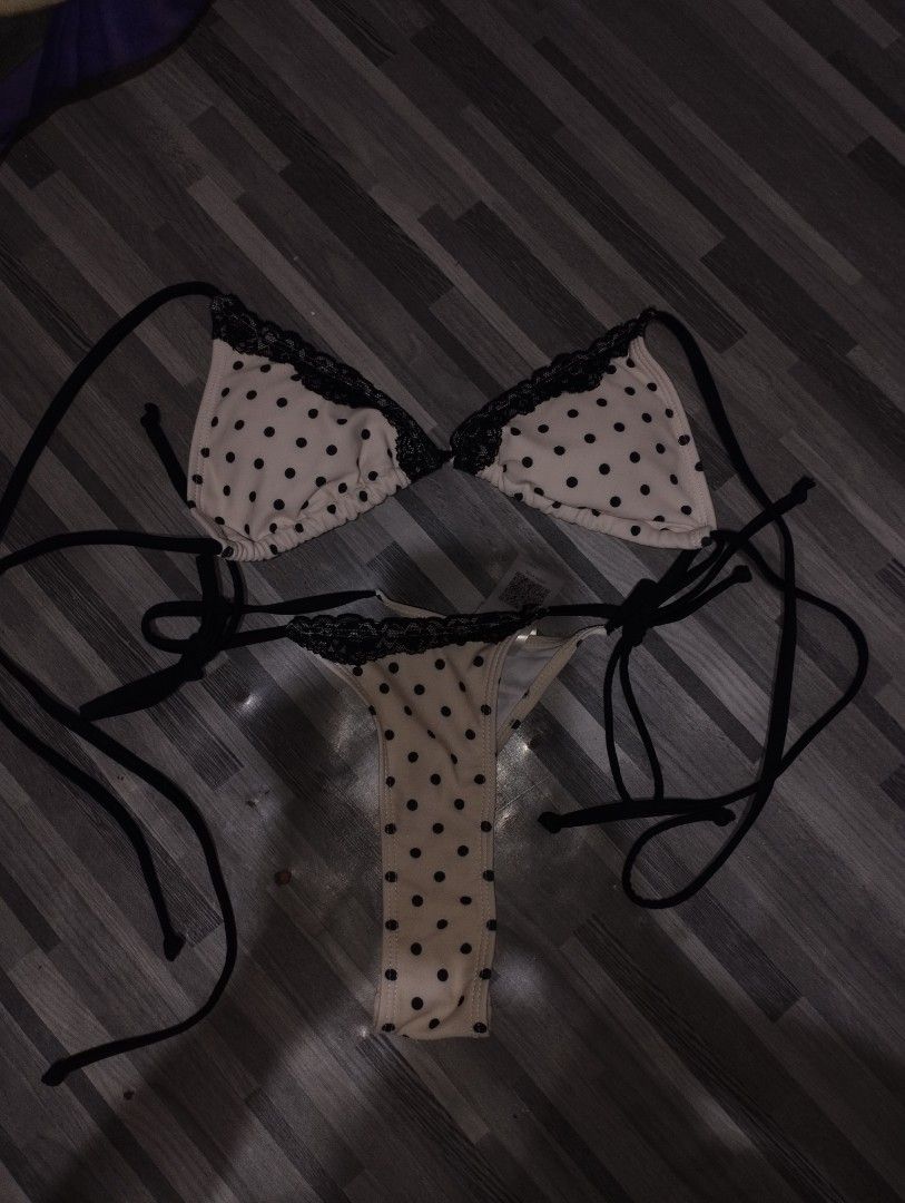 Polka dot bikini set with black lace trim (Category: Bikinis & Swimsuits) located in San Carlos. Submitted by t6kyo (Listing ID 1466286759, Image 1). Description: RFS: DECLUTTERING & NEEED FUNDS Bought it in shein Adjustable - Cream bikini set with playful black polka dots - Triangle top and string bottoms accented with delicate black lace - Fully adjustable black ties on the sides and neck for a custom fit - Brand new, unworn condition with orig