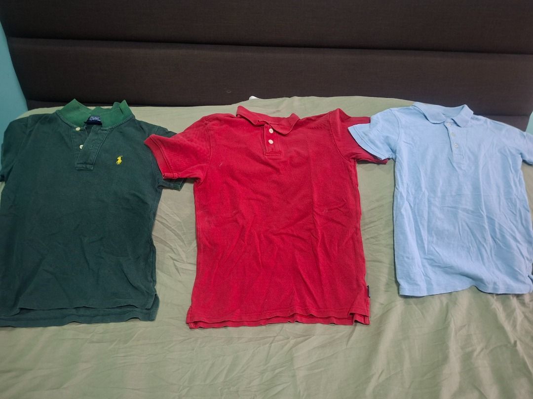 Polo shirts bundle of 3 (Category: Babies & Kids Fashion) located in General Trias. Submitted by lonzocorner (Listing ID 1466229141, Image 1). Description: Size 6-7Y Bundle of 3 short-sleeve polo shirts in dark green, red, and light blue. Features classic collars, button plackets, and a comfortable fit for everyday casual wear..