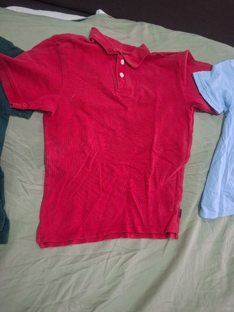 Polo shirts bundle of 3 (Category: Babies & Kids Fashion) located in General Trias. Submitted by lonzocorner (Listing ID 1466229141, Image 3). Description: Size 6-7Y Bundle of 3 short-sleeve polo shirts in dark green, red, and light blue. Features classic collars, button plackets, and a comfortable fit for everyday casual wear..