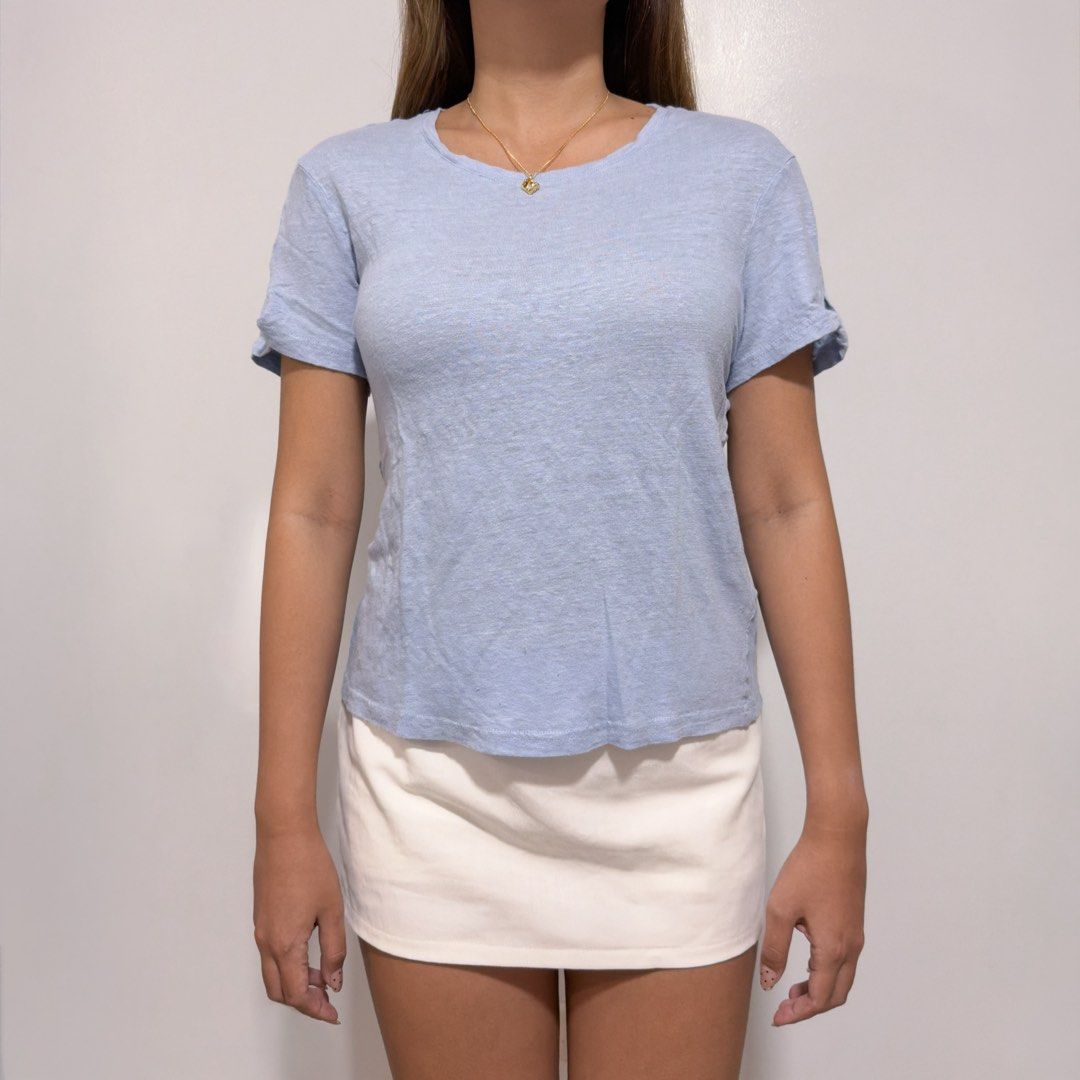 powder blue shirt (Category: Blouses) located in Cebu City. Submitted by cuteoncue (Listing ID 1466324251, Image 1). Description: small-large (small on tag - highly stretchable) please see last photo for washable stains and minor pinholes. the item was freshly laundered but not soaked or stain-treated..