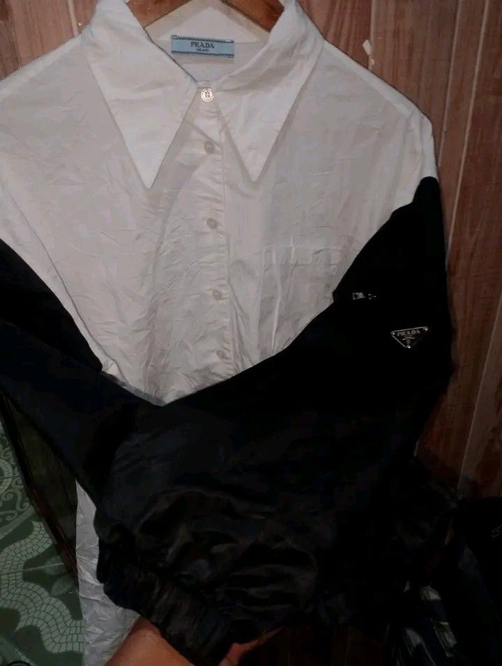 PRADA (Category: Tshirts & Polo Shirts ) located in Taguig. Submitted by clothingselection (Listing ID 1466199552, Image 3). Description: PTPA PRADA POLO LS BUTTON DOWN 23 X 29 VERYGOOD CONDITION NID WASH FRESH FROM BALE.