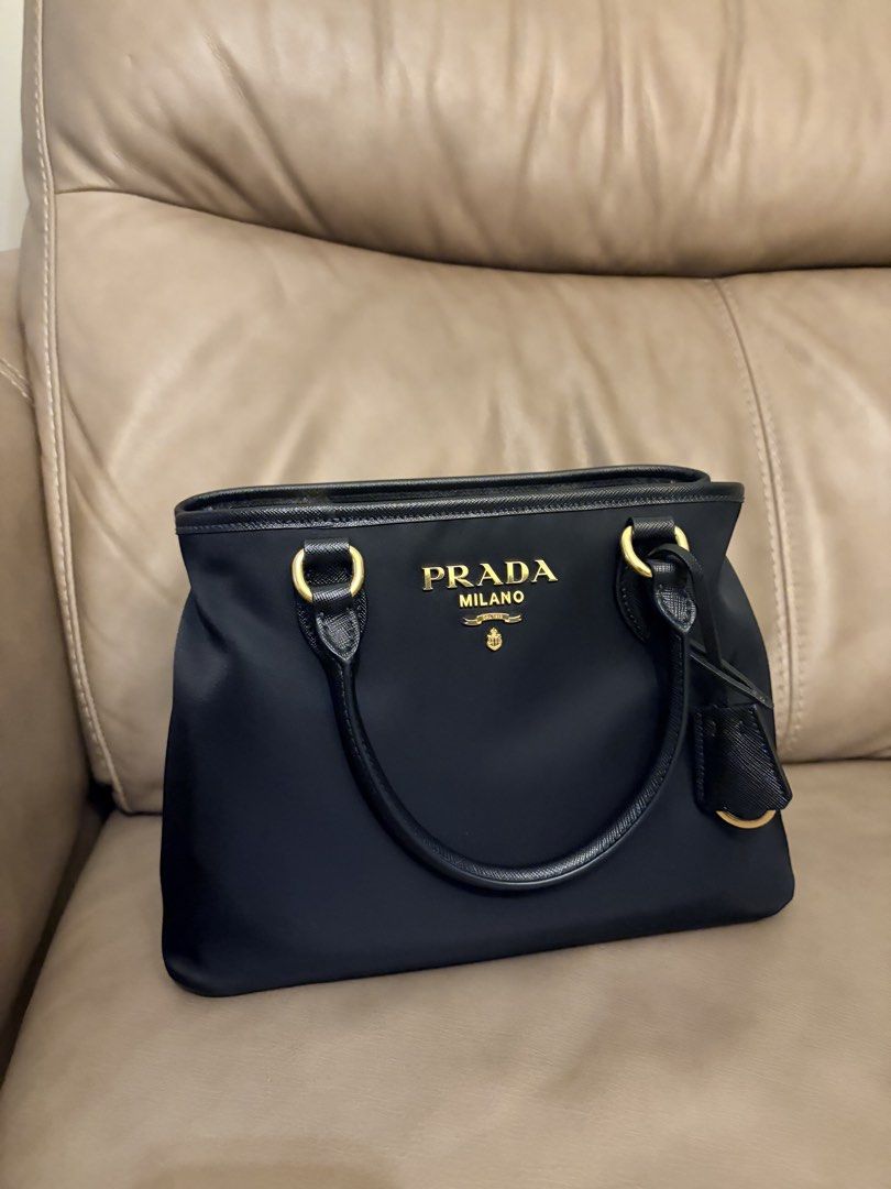Prada Black Nylon Tote Bag With Gold Hardware (Category: Luxury Bags & Wallets) located in Makati City. Submitted by decluttering_28 (Listing ID 1466255051, Image 2). Description: Brand new Complete inclusions With receipt Bought from prada new york.