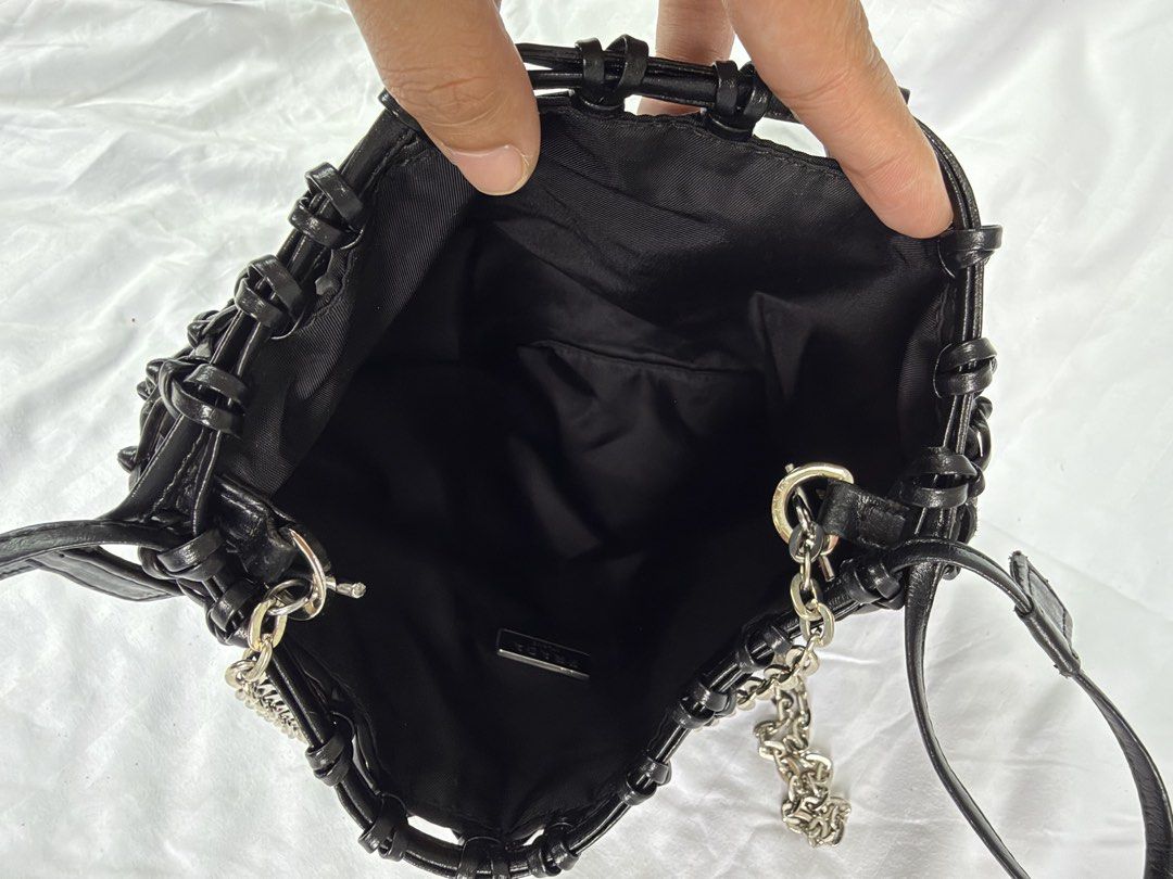 Prada fishnet with provided chain (Category: Purses & Pouches) located in Makati City. Submitted by moiobsession (Listing ID 1466270693, Image 3). Description: with provided silver long crossbody chain rare fish net bag. with white tag pa .