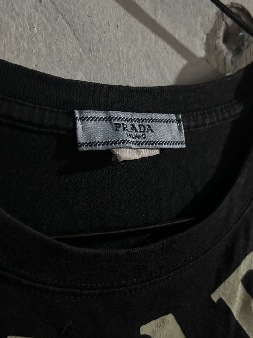 Prada Milano Black Shirt (Category: Shirts) located in Quezon City. Submitted by bunnyrack.co (Listing ID 1466258446, Image 3). Description: cracked prints 📍commonwealth, qc.