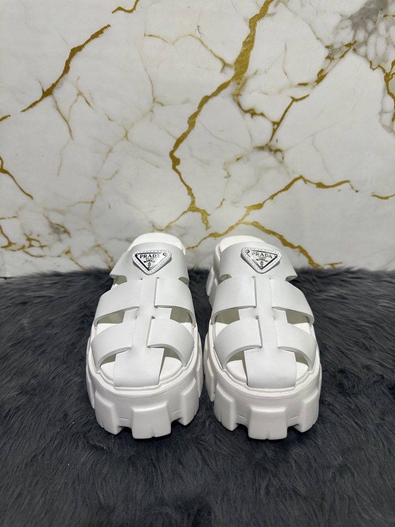 Prada platform (Category: Flats & Sandals) located in Marikina City. Submitted by georgiaprelovestuff (Listing ID 1466188887, Image 1). Description: size 38 PLEASE READ BEFORE MAKING AN OFFER: 🔹No inclusions since this is preloved 🔹NO to low ballers please 🔹NO meetups due to busy schedule 🔹If you make an offer, please get the item let's not waste each other's time 🔹NO return NO exchange NO cancellation 🔹Please manage your expectation since 