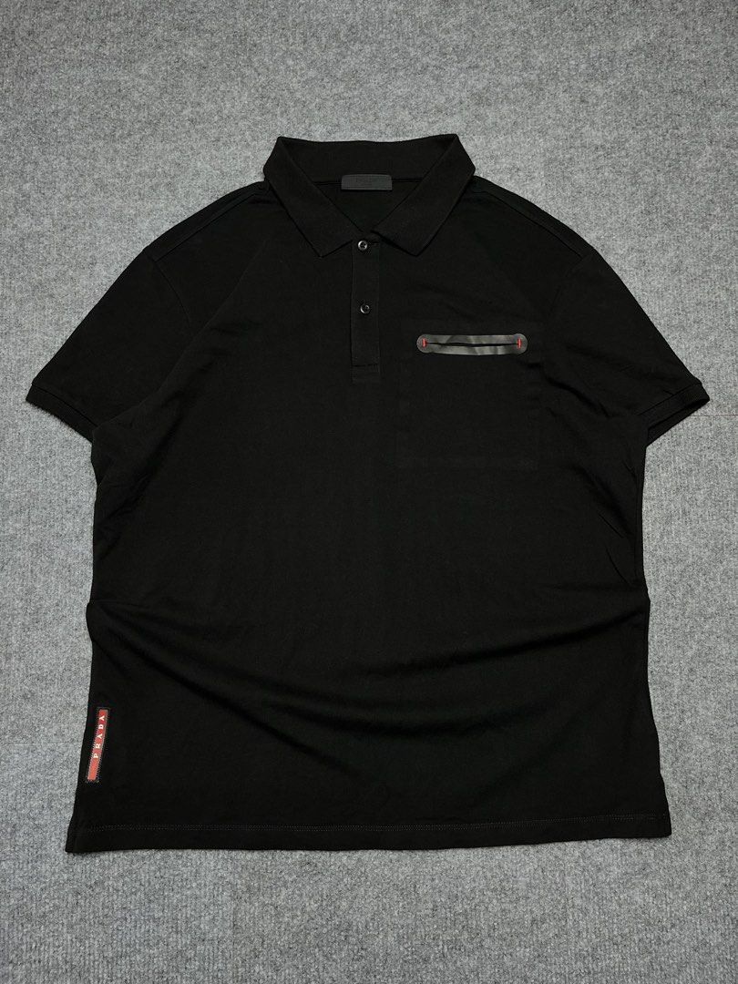 Prada polo shirt (Category: Formal Shirts) located in Angono. Submitted by thriftnalang (Listing ID 1466238456, Image 1). Description: Prada polo shirt as new condition W-22 |L-26 XL on tag Cut wash tag only but guaranteed authentic .