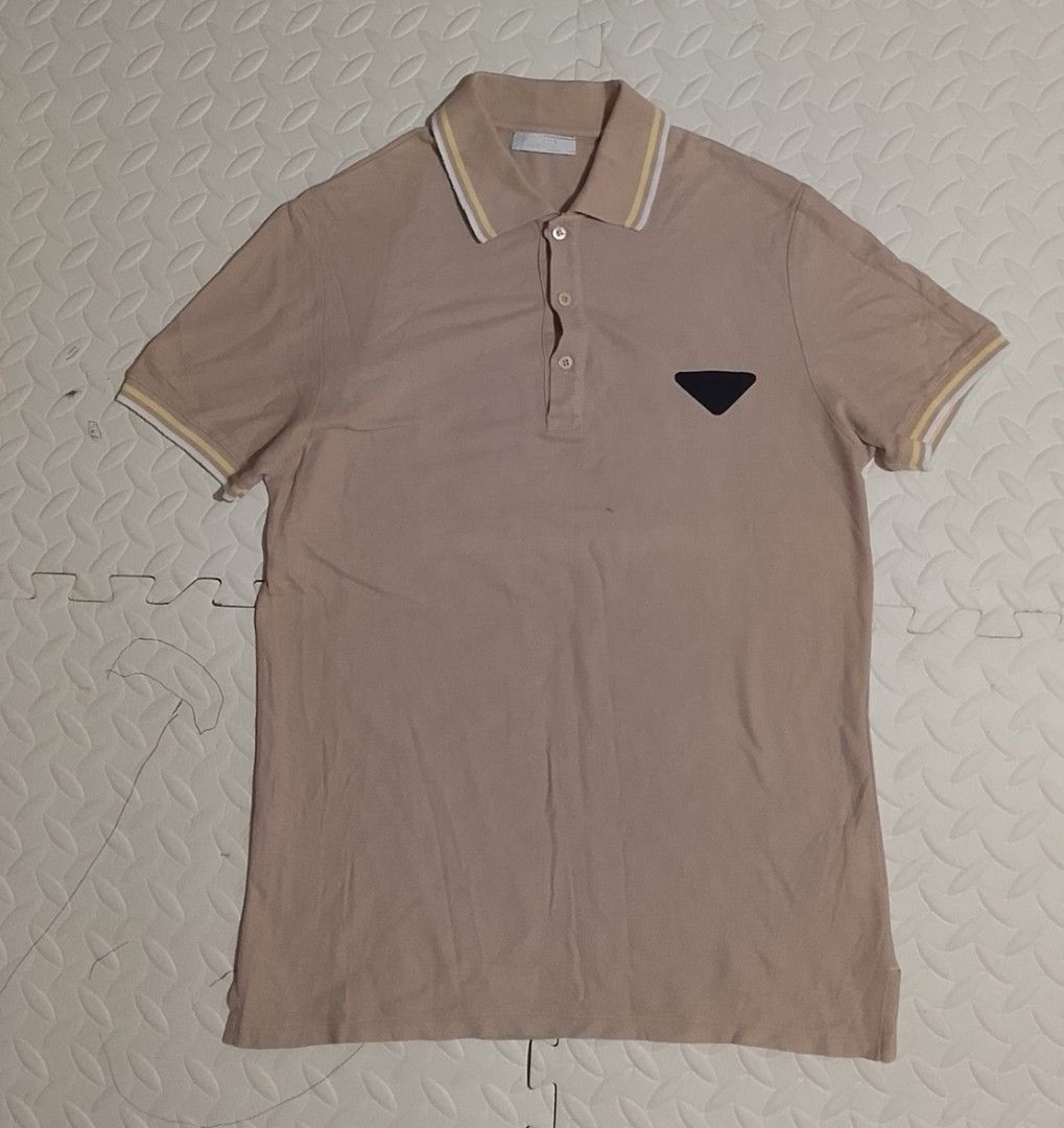 Prada polo shirt (Category: Activewear) located in Manila. Submitted by modern-market (Listing ID 1466243182, Image 1). Description: Prada polo shirt size:med W:19 L:27 as new condition.