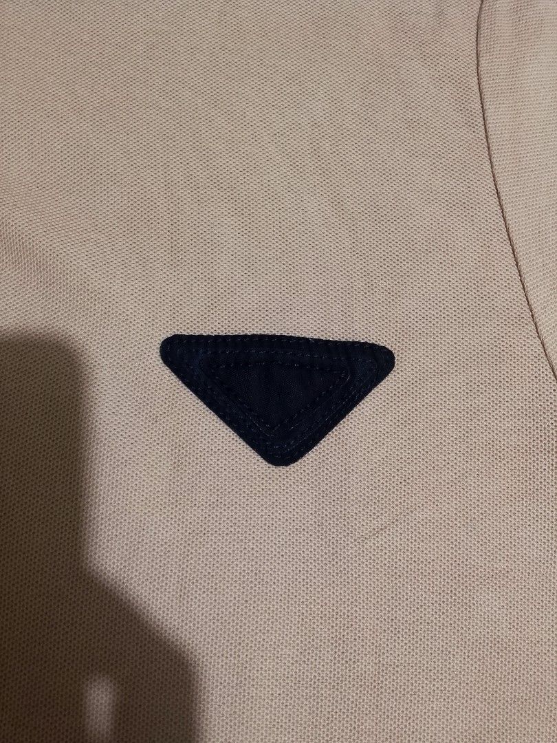 Prada polo shirt (Category: Activewear) located in Manila. Submitted by modern-market (Listing ID 1466243182, Image 2). Description: Prada polo shirt size:med W:19 L:27 as new condition.