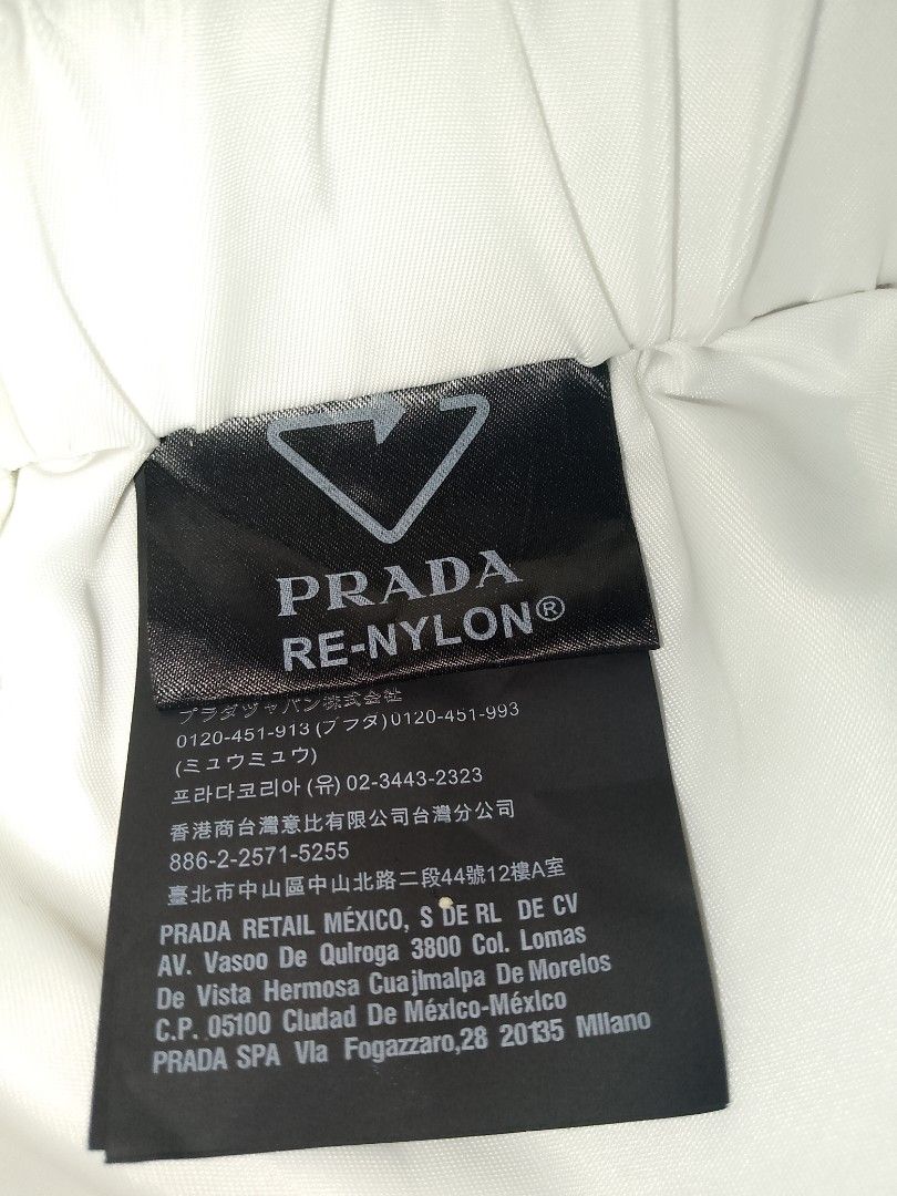 Prada re nylon mens short (Category: Shorts) located in San Pedro. Submitted by bethc.729 (Listing ID 1466221070, Image 3). Description: Prada white re nylon shorts for men .in very good conditioned.pm for more pics ..