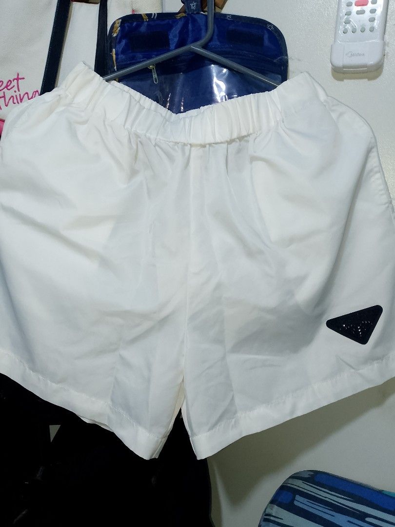 Prada re nylon mens short (Category: Shorts) located in San Pedro. Submitted by bethc.729 (Listing ID 1466221070, Image 1). Description: Prada white re nylon shorts for men .in very good conditioned.pm for more pics ..
