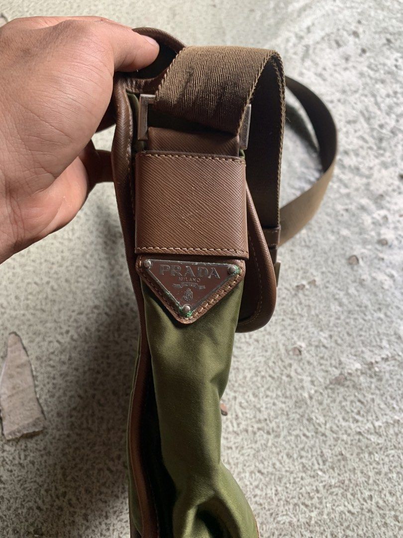 Prada sling bag (Category: Luxury Bags & Wallets) located in Davao. Submitted by kalbosouthlandkings13 (Listing ID 1466212855, Image 3). Description: Prada sling bag Excellent condition 9.8/10 color rate issue see picture .