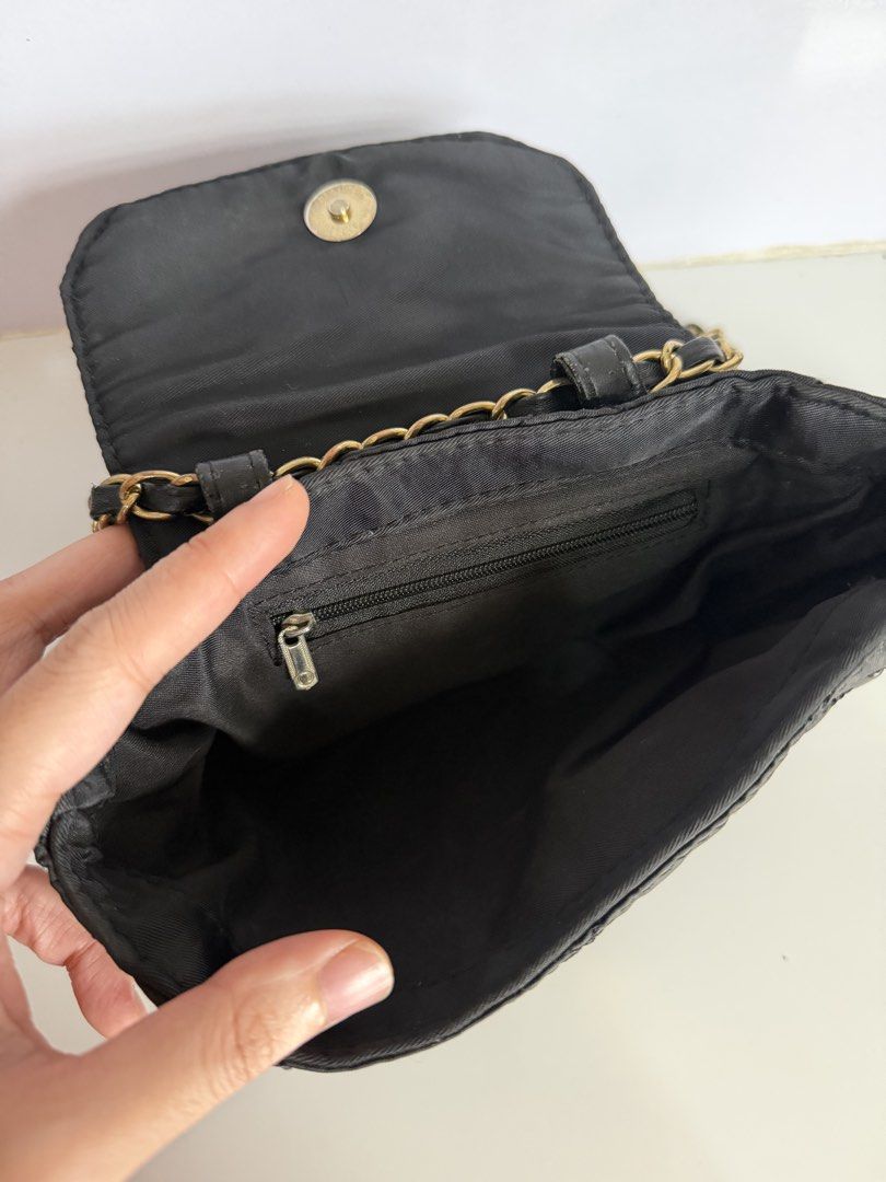 Prada Sling Bag (Category: Luxury Bags & Wallets) located in Iloilo. Submitted by youngrabbit.b5670d (Listing ID 1466233466, Image 3). Description: Preloved (never used) Has flaws from prolonged storage Please self-authenticate.