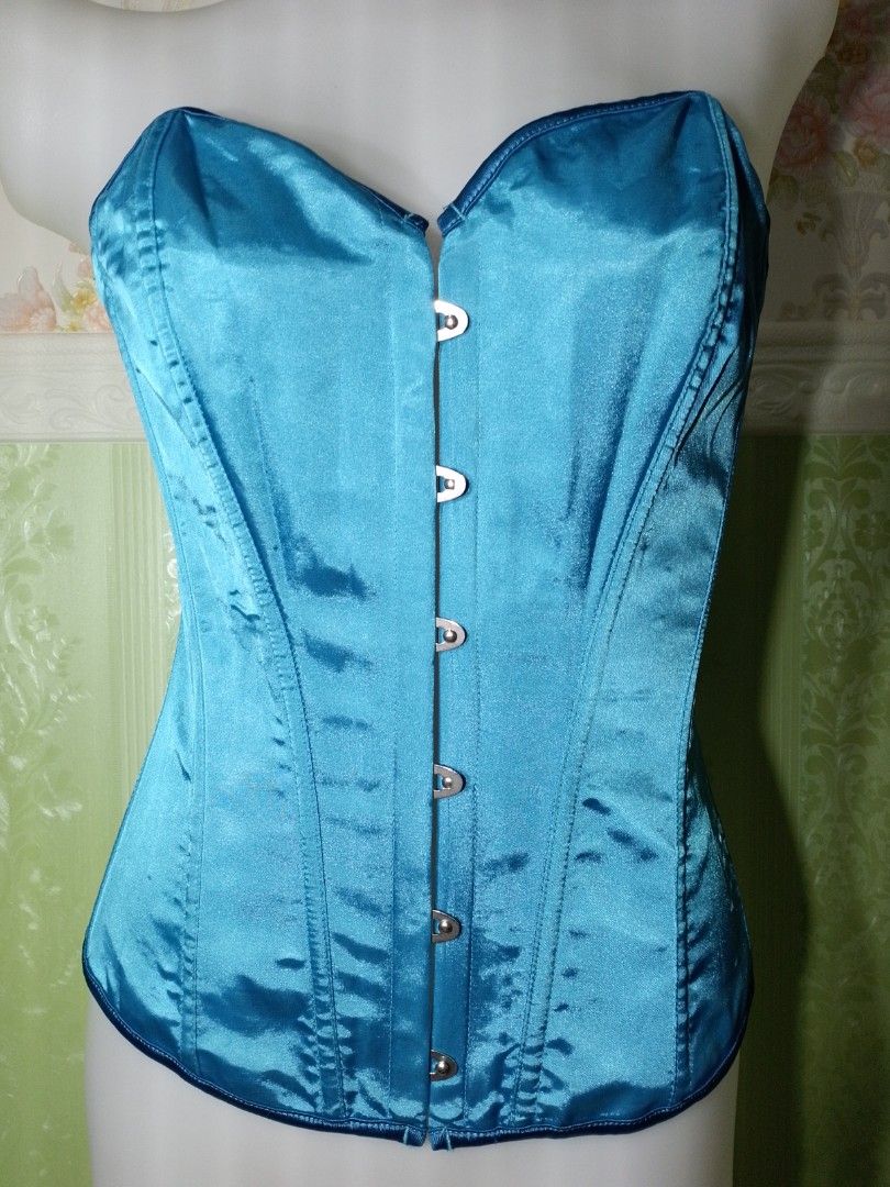 Preloved Blue green Magnetic Corset Top (Category: Others Tops) located in Dasmarinas. Submitted by ms.happycorsets (Listing ID 1466292931, Image 2). Description: Preloved Magnetic Corset Blue green Color Can Fit to Small size to medium size Starting waistline 27-30 inches length 16 inches Not Stretchable Fabric Has Lace tie adjustable at the back Has 14 Soft bones with Slight flaws Actual Photo Color may Change due to Camera Flash 💕 Disregard t