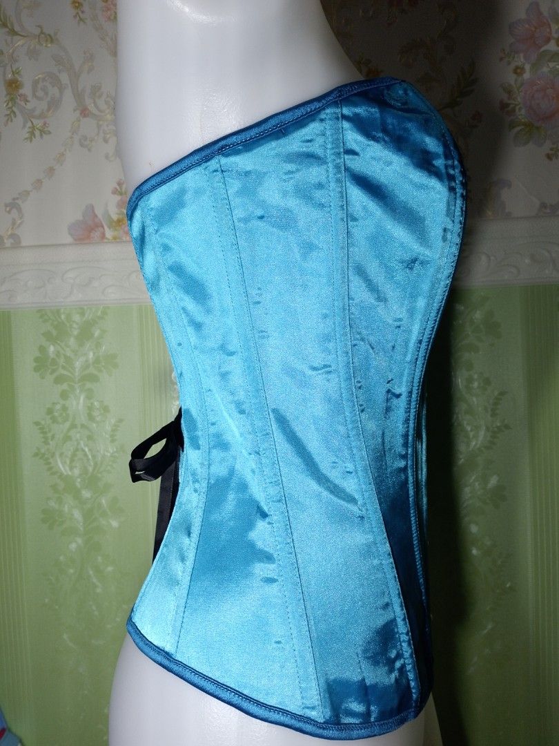Preloved Blue green Magnetic Corset Top (Category: Others Tops) located in Dasmarinas. Submitted by ms.happycorsets (Listing ID 1466292931, Image 3). Description: Preloved Magnetic Corset Blue green Color Can Fit to Small size to medium size Starting waistline 27-30 inches length 16 inches Not Stretchable Fabric Has Lace tie adjustable at the back Has 14 Soft bones with Slight flaws Actual Photo Color may Change due to Camera Flash 💕 Disregard t