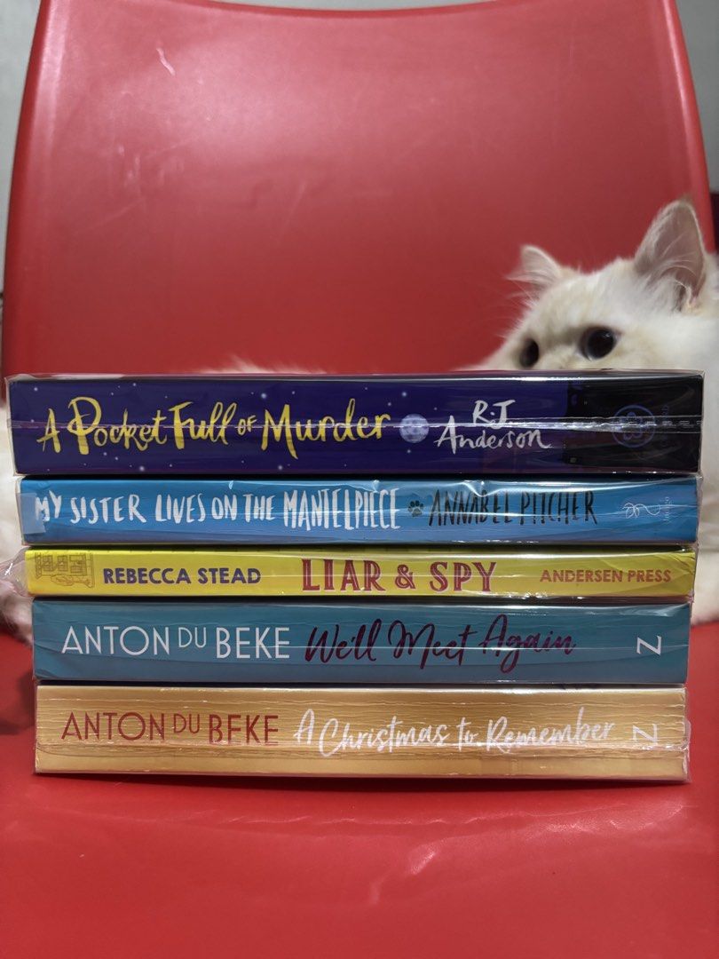 Preloved books (Category: Storybooks) located in Quezon City. Submitted by kizumei (Listing ID 1466303239, Image 1). Description: A Pocket Full of Murder by RJ Anderson - Php180 My Sister Lives on the Mantelpiece by Annabel Pitcher (stenciled edge) - Php150 Liar & Spy by Rebecca Stead - Php100 A Christmas to Remember & We'll Meet Again by Anton Du Beke (Set) - Php150.