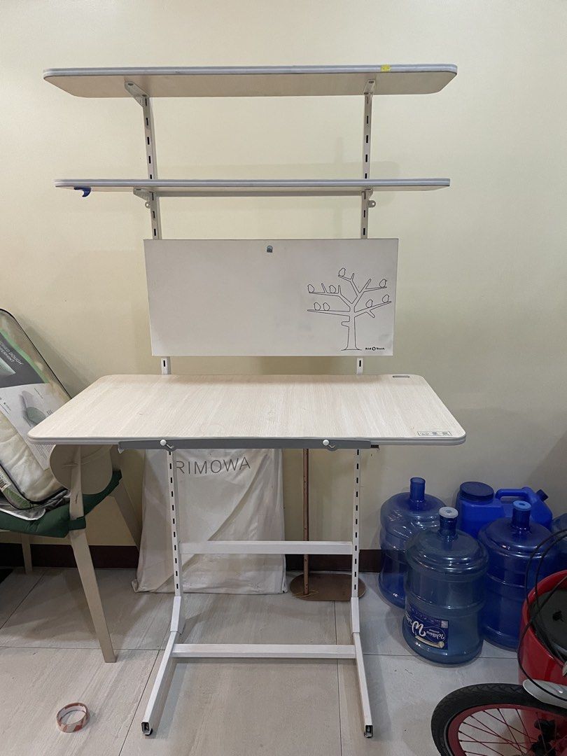 Preloved desk and computer table adjustable (Category: Office Furniture & Fixtures) located in Caloocan City. Submitted by prelovedbybets (Listing ID 1466232859, Image 3). Description: Moving out adjustable computer table and desk table .