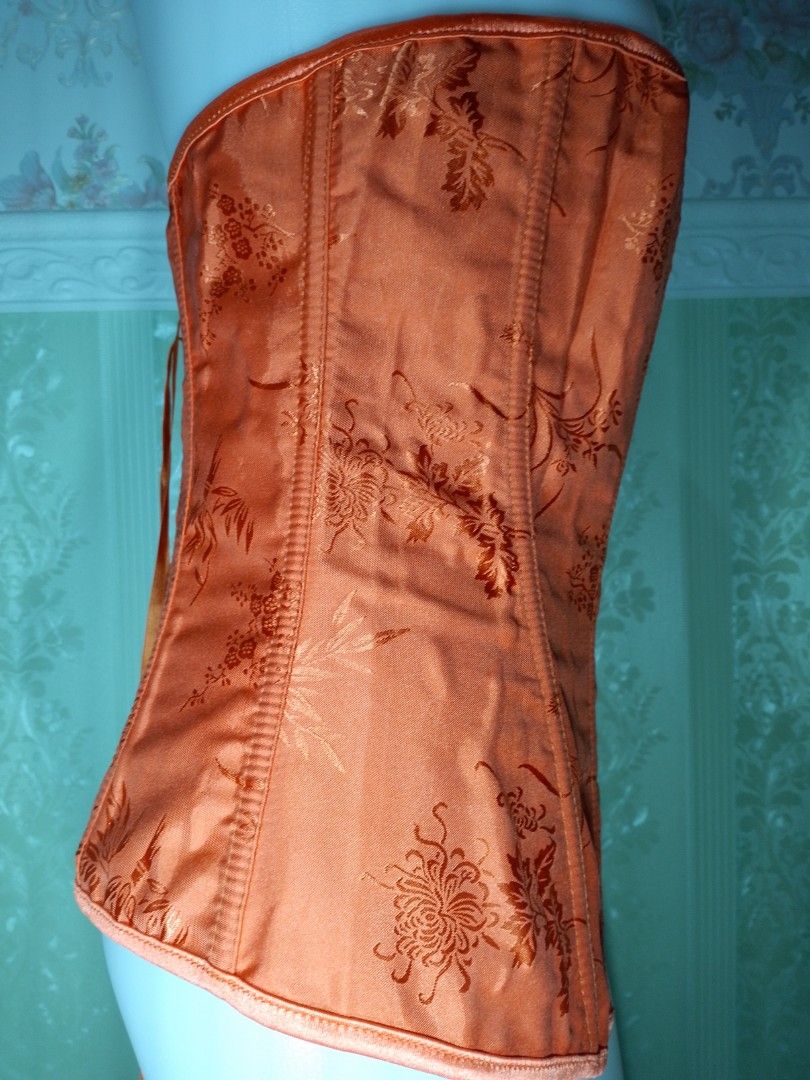 Preloved Orange Magnetic Corset Top (Category: Others Tops) located in Dasmarinas. Submitted by ms.happycorsets (Listing ID 1466294614, Image 3). Description: Preloved Magnetic Corset Orange Color Can Fit to Extra Large size Starting waistline 32-36 inches length 16 inches Not Stretchable Fabric Has Lace tie adjustable at the back Has 10 Soft bones with Slight flaws Actual Photo Color may Change due to Camera Flash 💕 Disregard the lines due to f