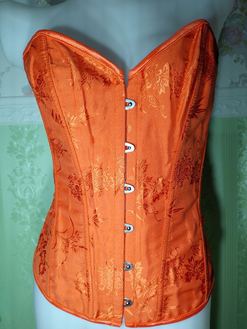 Preloved Orange Magnetic Corset Top (Category: Others Tops) located in Dasmarinas. Submitted by ms.happycorsets (Listing ID 1466294614, Image 2). Description: Preloved Magnetic Corset Orange Color Can Fit to Extra Large size Starting waistline 32-36 inches length 16 inches Not Stretchable Fabric Has Lace tie adjustable at the back Has 10 Soft bones with Slight flaws Actual Photo Color may Change due to Camera Flash 💕 Disregard the lines due to f
