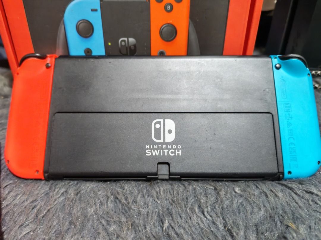 Pre-owned / Nintendo Switch Oled - Complete Set W. Games (Category: Nintendo) located in Manila. Submitted by nider_dc (Listing ID 1466283266, Image 2). Description: For only 9,500.00 ‼️ Pre-owned , not brand new! ‼️ Walang issue, walang sakit ng ulo! ‼️ All buttons working! ‼️ Analogs, buo ang rubber walang drift ‼️ Display no error, no scratch ‼️ Condition 9/10 scratches sa back and front sobrang minor. importante sa main screen walang scratche