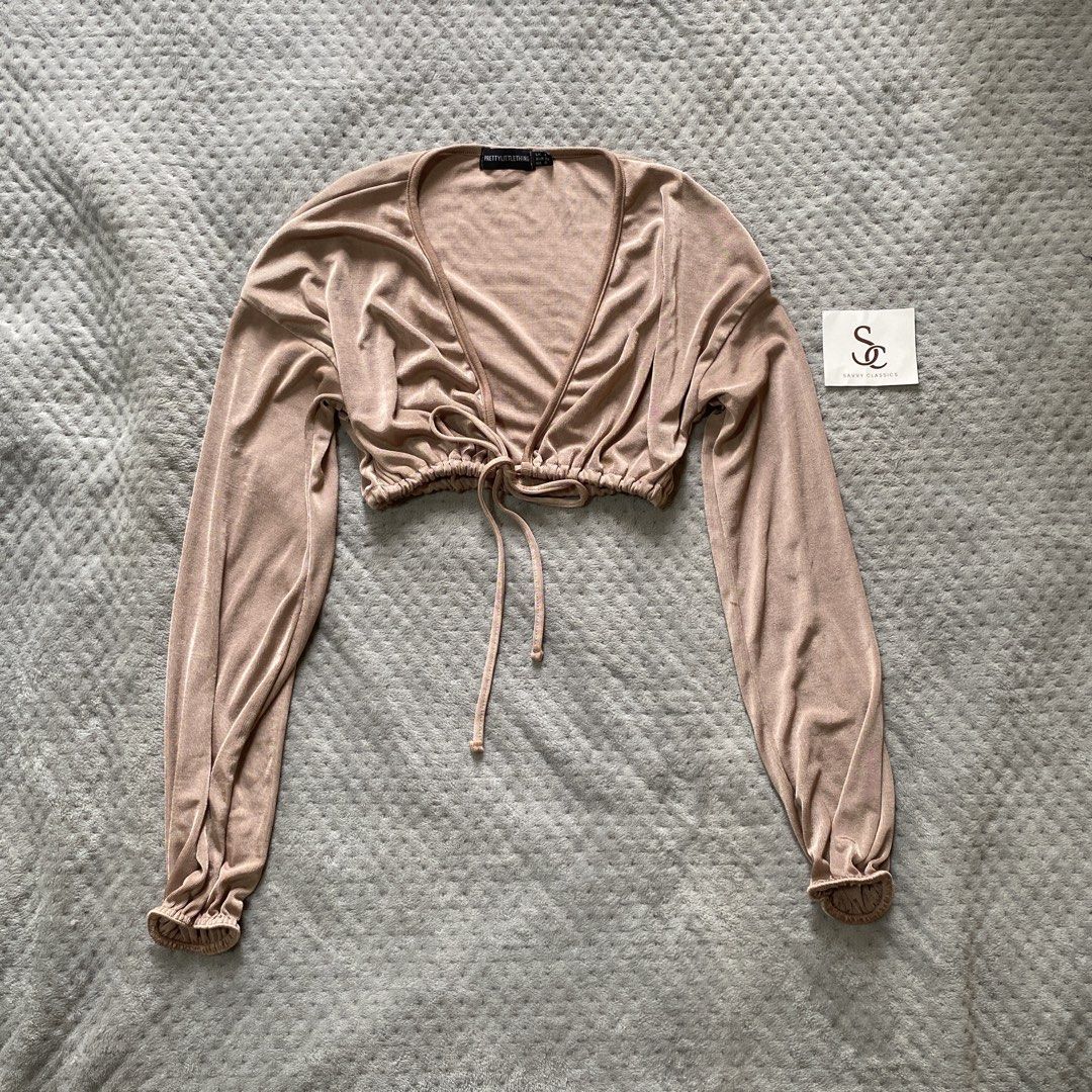 Prettylittlething cute self tie longsleeve top (Category: Longsleeves) located in Ajuy. Submitted by savvyclassics (Listing ID 1466311683, Image 1). Description: s to semi L has dot stain.