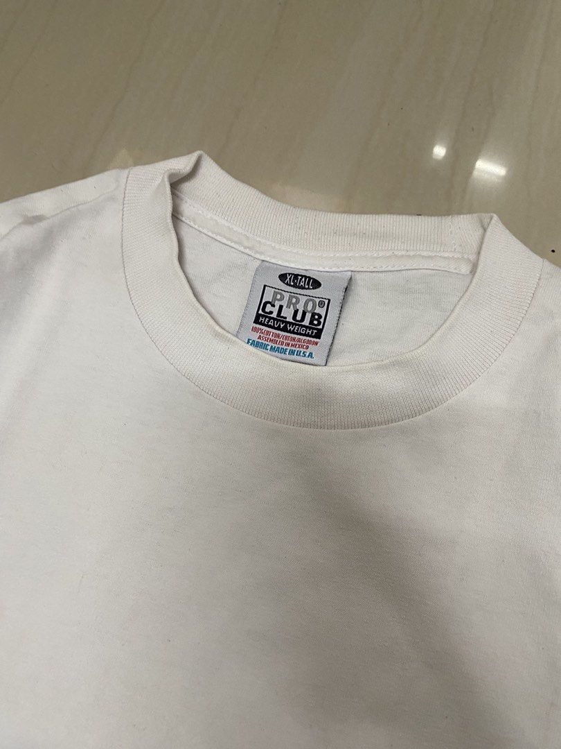 Proclub White Tee XL (Category: Formal Shirts) located in General Trias. Submitted by gotemthrifts.2004 (Listing ID 1466260616, Image 2). Description: 23 x 30 good condition yellow spots (removable when washed) slick collar!.