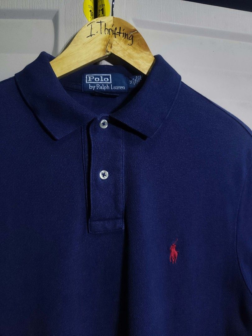 Ralph Lauren Navy Blue (Category: Tshirts & Polo Shirts ) located in Bacolod City. Submitted by i.thrifting (Listing ID 1466282800, Image 2). Description: Ralph Lauren Navy Blue 20x 28 (Front) 30 (Back Minimal Fold Line (unnoticeable when worn) Authentic Very Good Condition color rate 9.8/10.