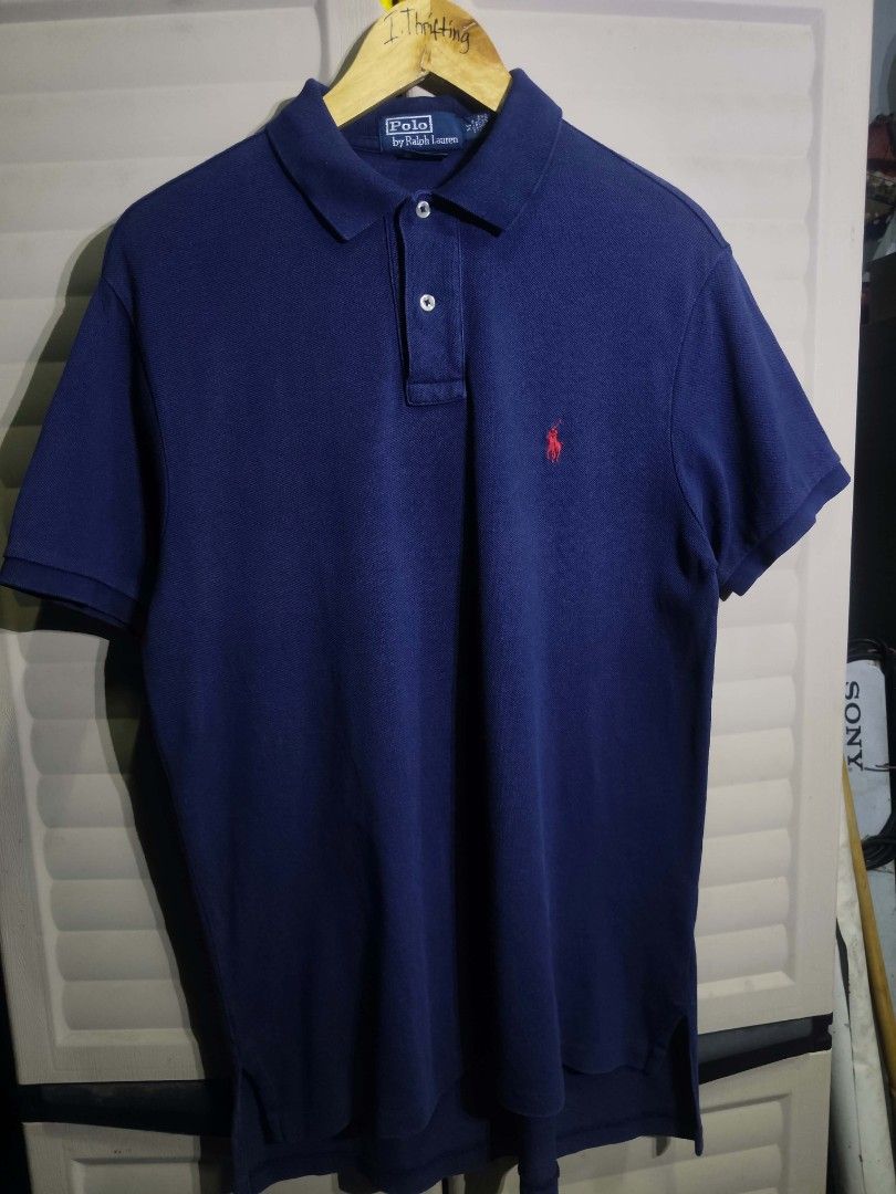Ralph Lauren Navy Blue (Category: Tshirts & Polo Shirts ) located in Bacolod City. Submitted by i.thrifting (Listing ID 1466282800, Image 1). Description: Ralph Lauren Navy Blue 20x 28 (Front) 30 (Back Minimal Fold Line (unnoticeable when worn) Authentic Very Good Condition color rate 9.8/10.