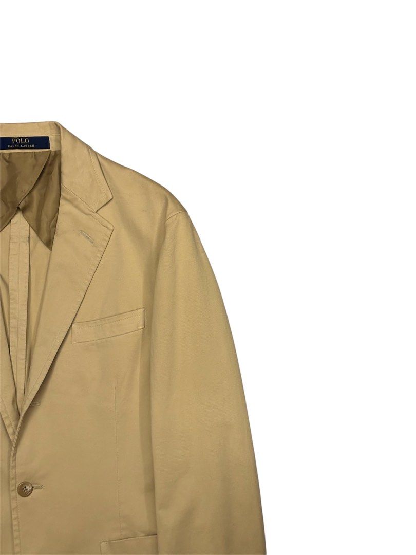 Ralph Lauren Unconstructed Chino Tailored Jacket (Category: Coats, Jackets and Outerwear) located in Valenzuela. Submitted by katadatakph (Listing ID 1466318648, Image 2). Description: Ralph Lauren Unconstructed Chino Tailored Jacket Monument Tan Size: 38 (S-M) Dimes: Width 21 Shoulders 18 Length 28.5 Crafted from custom-developed, extra-stretch chino fabric, this Polo unconstructed jacket puts a modern spin on classic preppy style with its natur