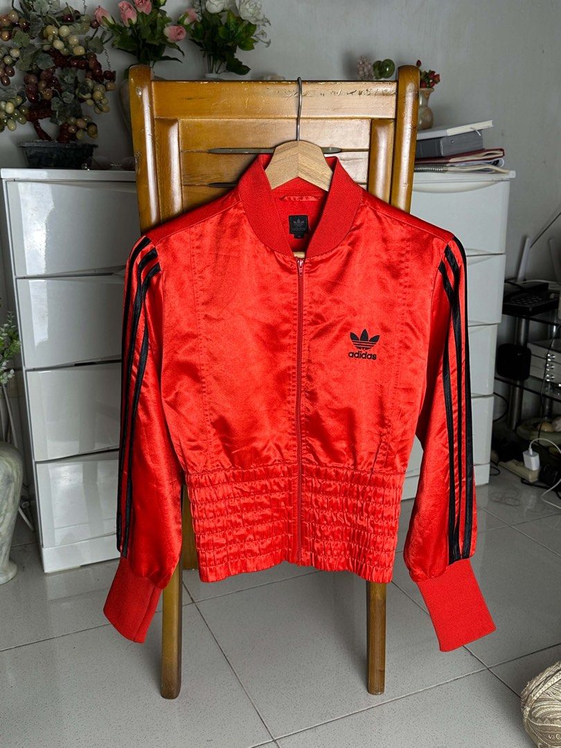 Rare Vintage Adidas Red Satin Bomber Jacket (Category: Coats, Jackets and Outerwear) located in Santa Rosa. Submitted by desireedelmonte07 (Listing ID 1466290049, Image 1). Description: 80’s Glanz D44 Women’s Retro Crop Size: 38 With tag fastener Signs of use only.