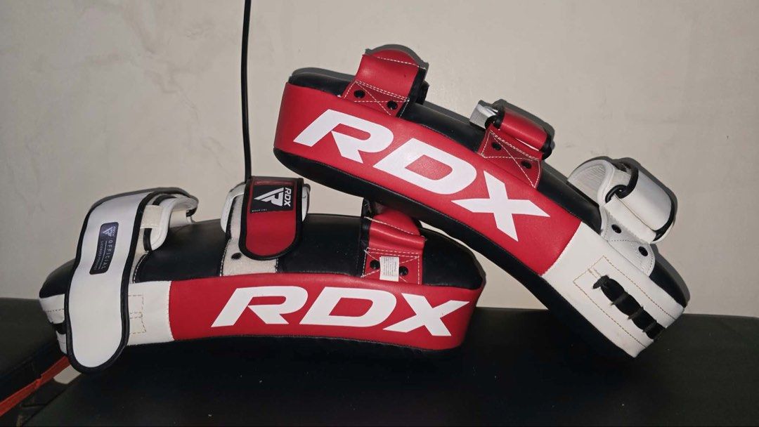 RDX Muay Thai Pad (Red) (Category: Combat Sports) located in Caloocan City. Submitted by yiyilittlethings (Listing ID 1466293971, Image 2). Description: RDX Muay Thai Pad (Red) Condition: Used, no issue good as new Original Price: 3k php Price: 2k (That’s the price for 1 piece, 4k pag pair).