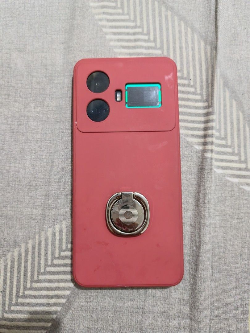Realme GT5 w/freebies (Category: Realme) located in Manila. Submitted by rafaellyns62118 (Listing ID 1466267730, Image 3). Description: For sale Realme GT5 -12gb ram / 256gb rom -Screen: 6.74" AMOLED - 1240 x 2772 -Qualcomm Snapdragon 8 Gen 2 -Camera: 3 (50 MP + 8 MP + 2 MP) -Battery: 5240 mAh -Refresh rate 144hz inclusion: -Complete : manuals, charger, box etc. -naka tempered glass na backcam and front screen - 5 cases color violet yung isa wala