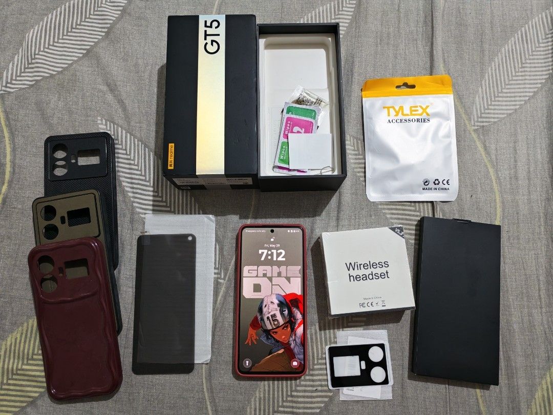Realme GT5 w/freebies (Category: Realme) located in Manila. Submitted by rafaellyns62118 (Listing ID 1466267730, Image 1). Description: For sale Realme GT5 -12gb ram / 256gb rom -Screen: 6.74" AMOLED - 1240 x 2772 -Qualcomm Snapdragon 8 Gen 2 -Camera: 3 (50 MP + 8 MP + 2 MP) -Battery: 5240 mAh -Refresh rate 144hz inclusion: -Complete : manuals, charger, box etc. -naka tempered glass na backcam and front screen - 5 cases color violet yung isa wala