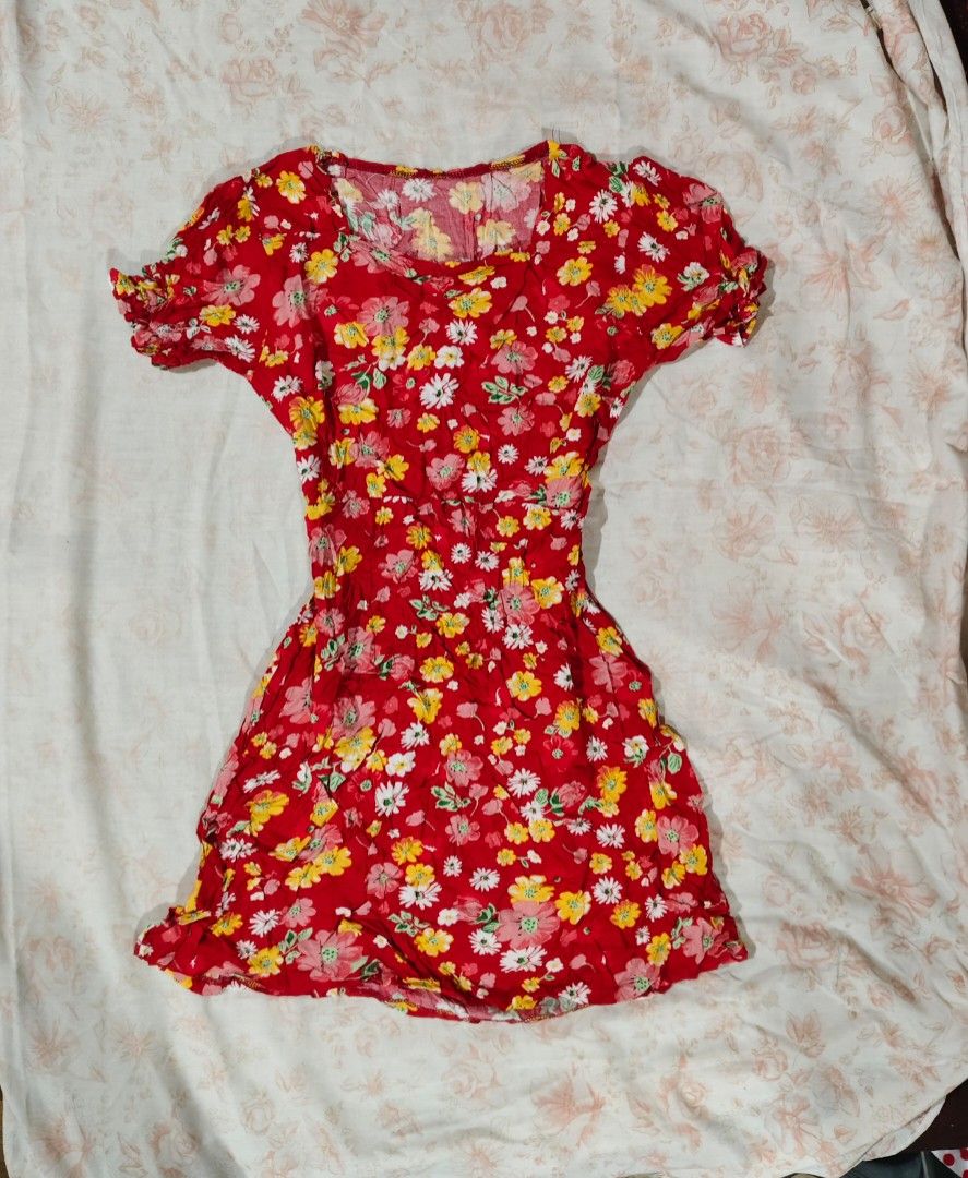 red floral ruffled hem mini dress (Category: Dresses) located in Bulacan. Submitted by angel.decluttersx (Listing ID 1466297656, Image 1). Description: small size cotton fabric material never worn pa no issue.