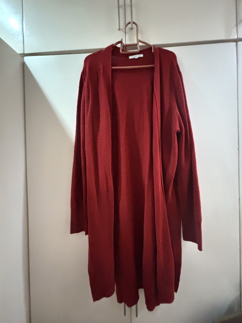 Red long knit cardigan open front outerwear size L (Category: Coats, Jackets and Outerwear) located in Las Pinas. Submitted by misg0905 (Listing ID 1466248932, Image 1). Description: - Color: Rich red - Length: Longline (past the knees) - Design: Open front, no buttons, straight hem - Material: Soft knit with vertical ribbing on front panels - Fit: Long sleeves, easy layering piece - Best for: Chilly weather or air-conditioned rooms.