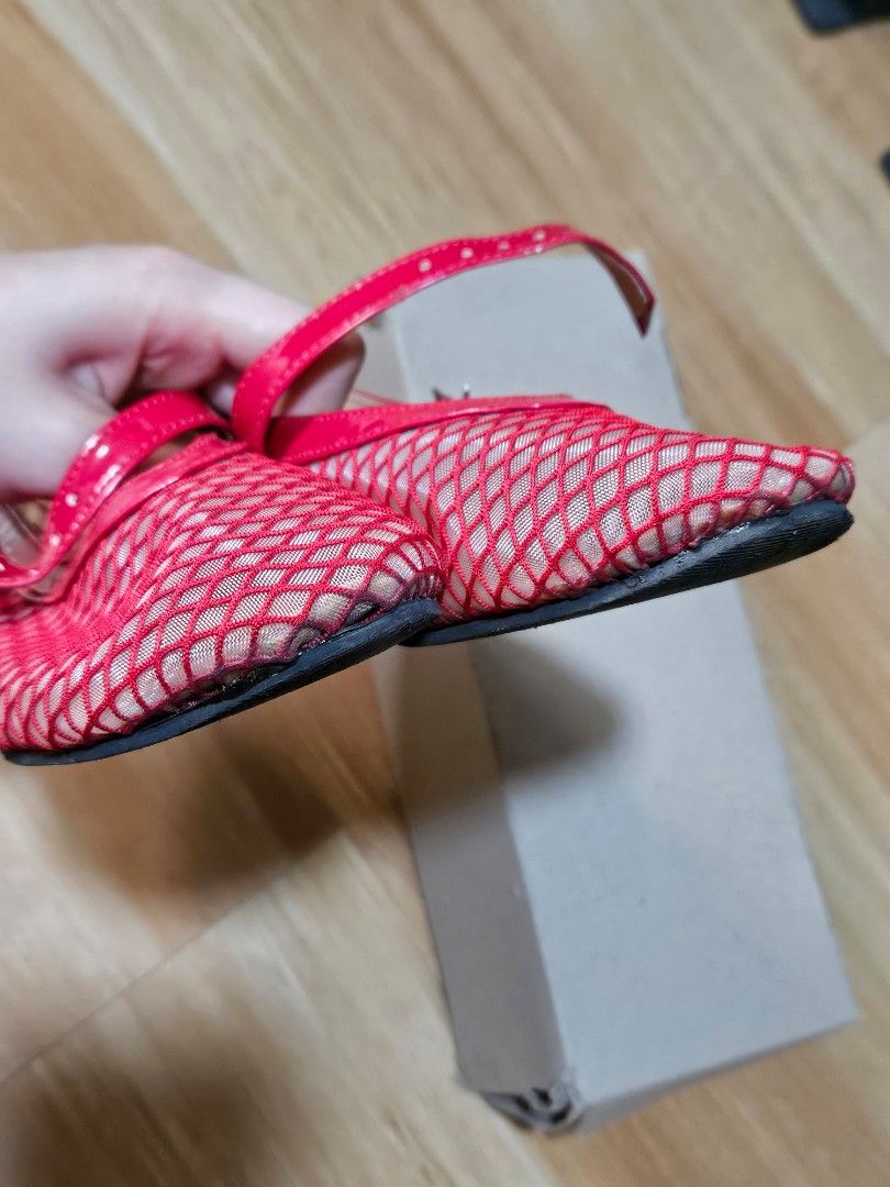 Red Mesh Mary Jane Flats Size 8 (Category: Flats & Sandals) located in Quezon City. Submitted by slipcattt (Listing ID 1466228979, Image 3). Description: - Style: Red mesh Mary Jane flats with shiny straps and adjustable buckles - Size: 8 (printed on inner sole) - Sole: Textured black rubber with minor dirt from previous wear - Inclusion: Comes with the original grey shoebox.