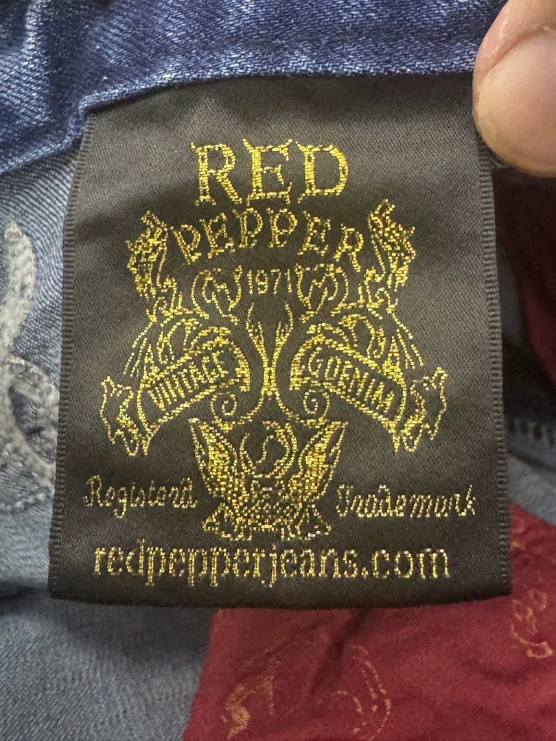 Red Pepper Japan & Co Jeans Size 28 (Category: Jeans) located in Lipa City. Submitted by cokelight11 (Listing ID 1466294424, Image 3). Description: Red Pepper Jeans Size 28 Washed blue denim with white embroidered script logo across the back waistband. Detailed cross patches on both rear pockets with studs. 98 percent cotton, 2 percent polyurethane. Machine wash cold. Made by Red Pepper Japan & Co. Excellent Condition .