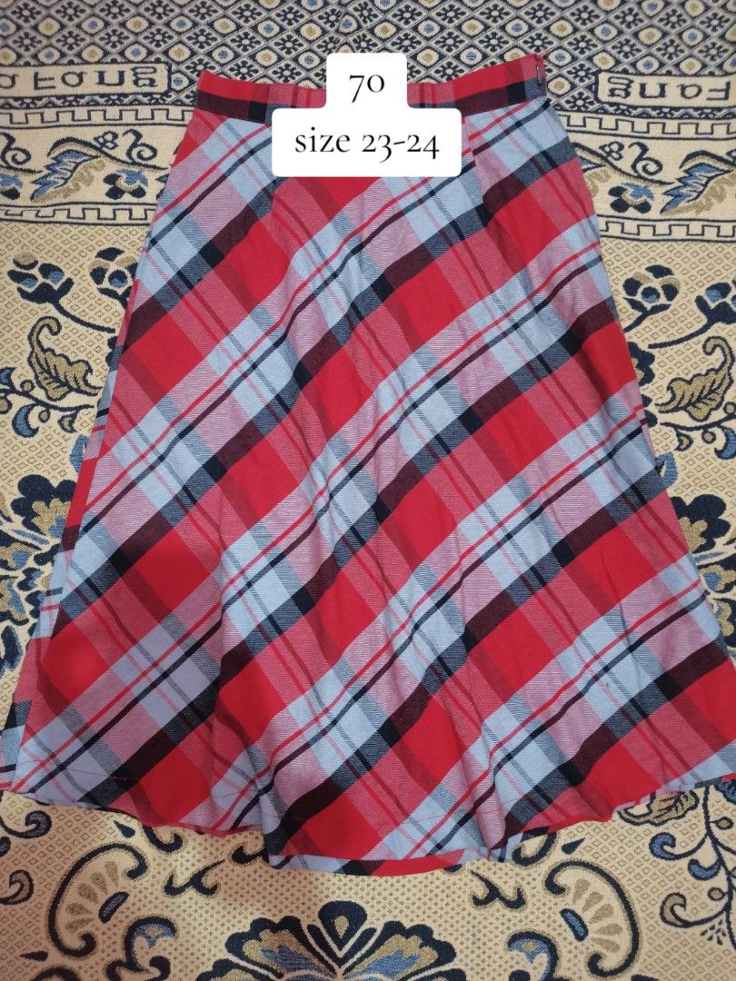 Red Plaid Diagonal Pattern Midi Skirt Size 23-24 (Category: Skirts) located in Dipolog. Submitted by true.brclo_thing (Listing ID 1466263866, Image 1). Description: - Style: Classic tartan red plaid midi skirt with a diagonal grey and black pattern - Fit: Structured flare cut, fits waist size 23-24 - Details: Convenient side zipper closure, clean hem, and tidy stitching throughout - Condition: Bright colors and well-maintained - Versatility: Easy