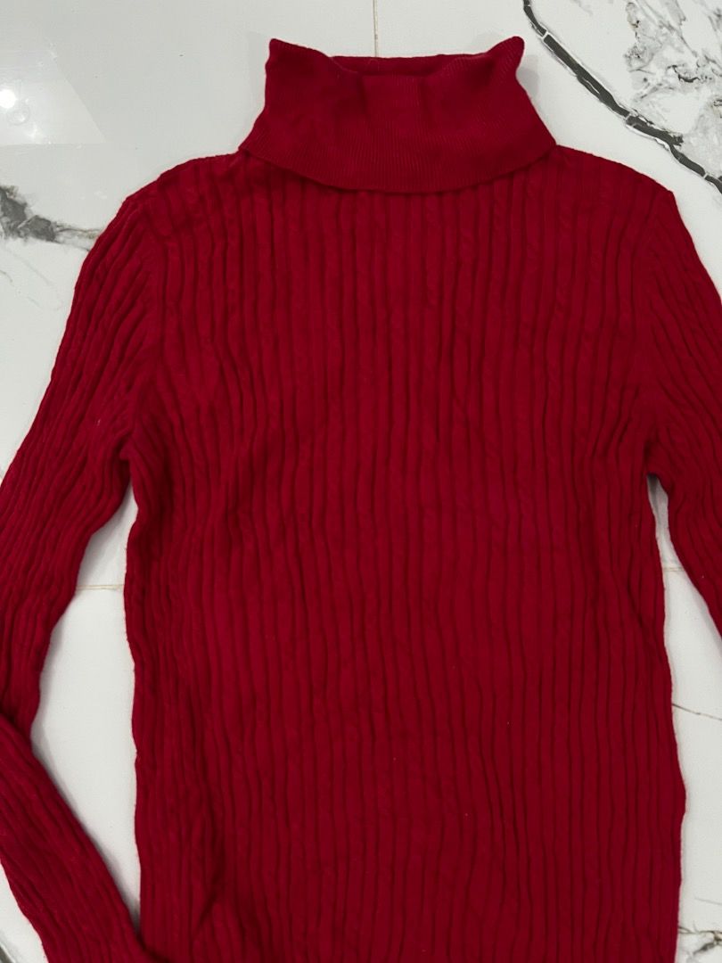 Red Ribbed Turtleneck Long Sleeve Sweater (Category: Longsleeves) located in Baguio. Submitted by pureearth.5f1c08 (Listing ID 1466227874, Image 2). Description: - Color: wine red -size: small-medium - Style: Turtleneck sweater with a fitted silhouette and long sleeves - Material: Soft ribbed knit, great for cold weather layering - Versatility: Classic design that pairs easily with jeans or skirts - Condition: Clean, no obvious flaws spotted.