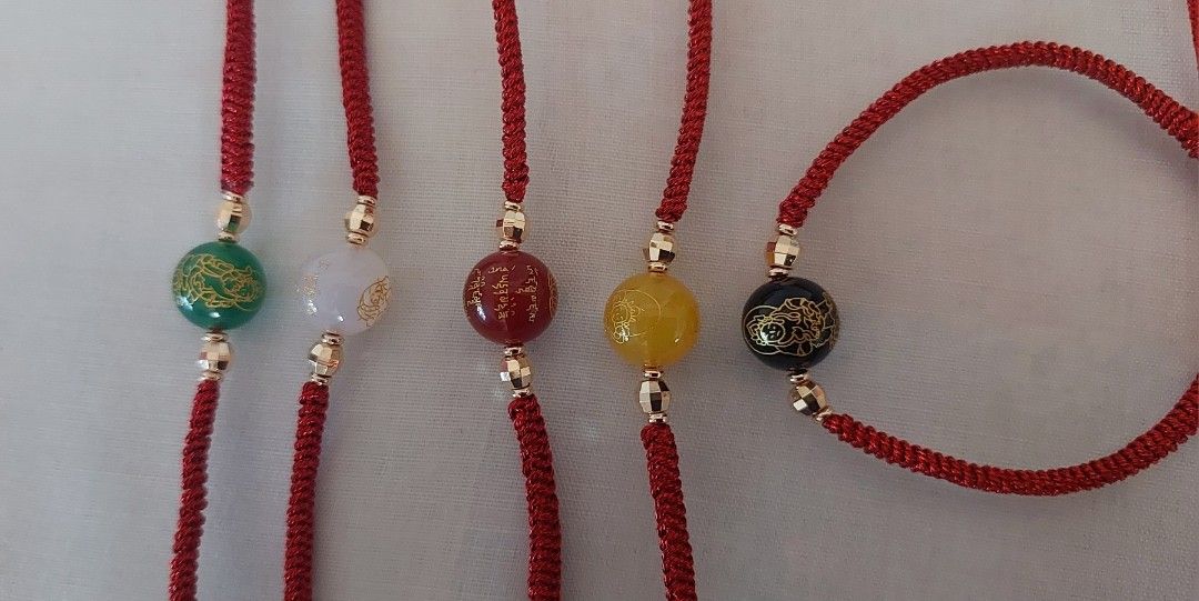 Red String Wealth God Bracelet (Category: Bracelets) located in Gapan. Submitted by purseofjune (Listing ID 1466033431, Image 1). Description: 16cm, adjustable red string 5 wealth gods red- associated with relationship and family harmony white- for professions yellow- for business luck black- for career advancement green- for health and vitality all colors available.