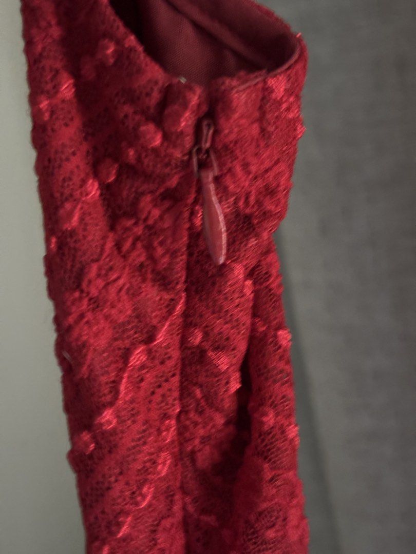 Red textured sleeveless dress (Category: Dresses) located in Manila. Submitted by erin_closet (Listing ID 1466222174, Image 3). Description: - Color: Rich red with subtle textured dot pattern - Style: Sleeveless, classic v-neckline, flared silhouette - Closure: Convenient side zipper - Measurements: ~45 inches total length, 11-12 inches flat waist across - Occasion: Ideal for parties, dinners, or date nights - Versatility: Easy to style up with h