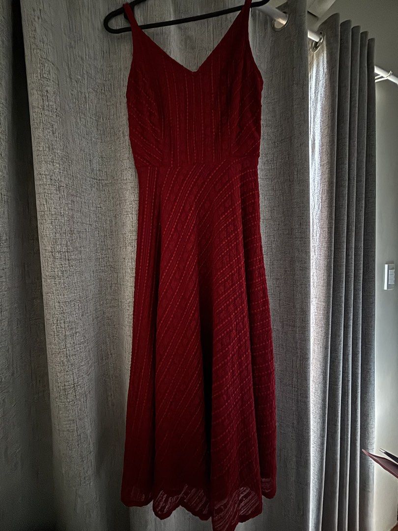Red textured sleeveless dress (Category: Dresses) located in Manila. Submitted by erin_closet (Listing ID 1466222174, Image 1). Description: - Color: Rich red with subtle textured dot pattern - Style: Sleeveless, classic v-neckline, flared silhouette - Closure: Convenient side zipper - Measurements: ~45 inches total length, 11-12 inches flat waist across - Occasion: Ideal for parties, dinners, or date nights - Versatility: Easy to style up with h