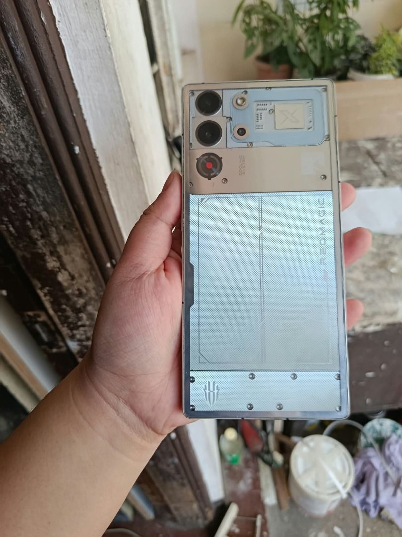 REDMAGIC 10 PRO (Category: Android) located in Manila. Submitted by kinaranda1999 (Listing ID 1466183023, Image 2). Description: - Brand/Model: REDMAGIC 10 Pro - Design: Sleek silver cyber-inspired transparent back with a full, uninterrupted bezel-less display - Processor: Snapdragon 8 Elite Octa-core Max 4.32GHz - RAM: (16GB + 12GB) - STORAGE 340GB / 512GB internal storage - Battery: Massive 7050 mAh - Screen Resolution: 2688*1216 - Condition: E