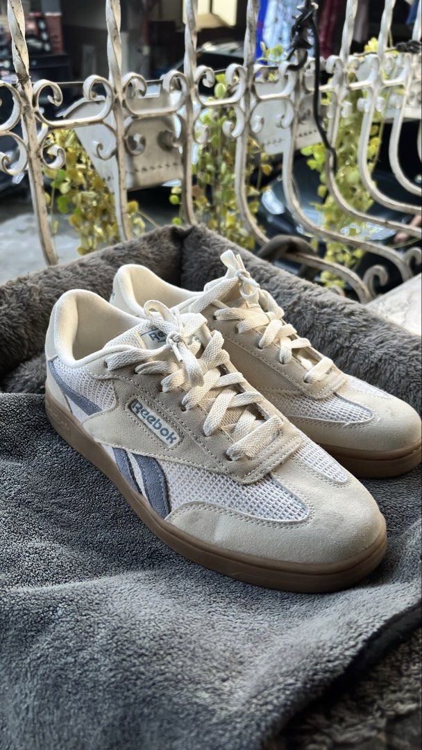 Reebok Cream Mesh Sneakers Size US 9 (Category: Sneakers) located in Malabon City. Submitted by danieljohn20283 (Listing ID 1466246015, Image 2). Description: - Brand: Reebok - Color: Cream and grey with mesh and suede panels - Sole: Classic gum sole with diamond tread pattern - Size: US 9 / UK 6.5 / EUR 40 / CM 26 - Origin: Made in China - Condition: Worn only a few times, very clean uppers and soles - Features: Cushioned collar and clean white 