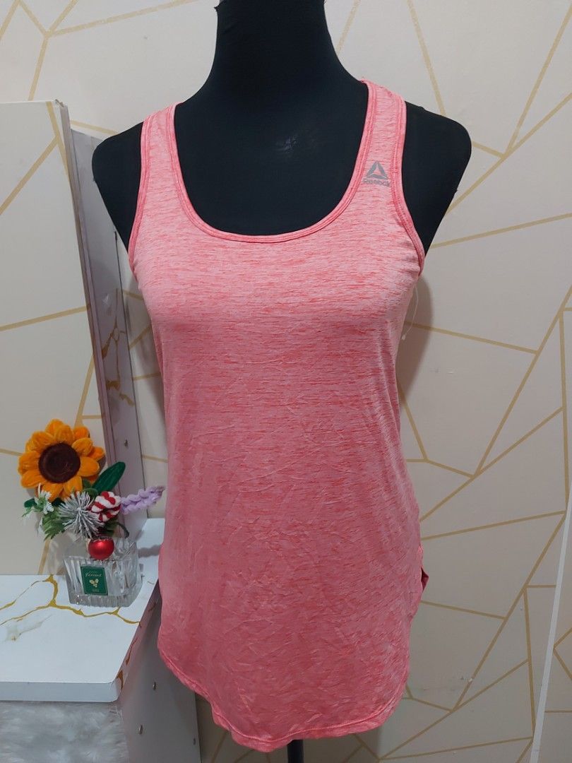 REEBOK pink top Activewear small (Category: Activewear) located in Manila. Submitted by jollyann_b1990 (Listing ID 1466319582, Image 1). Description: .